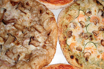 מבחר פיצות ייחודיות מבצק אוורירי ותוספות ייחדויות